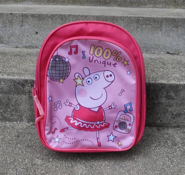 Pink children’s backpack, product photo